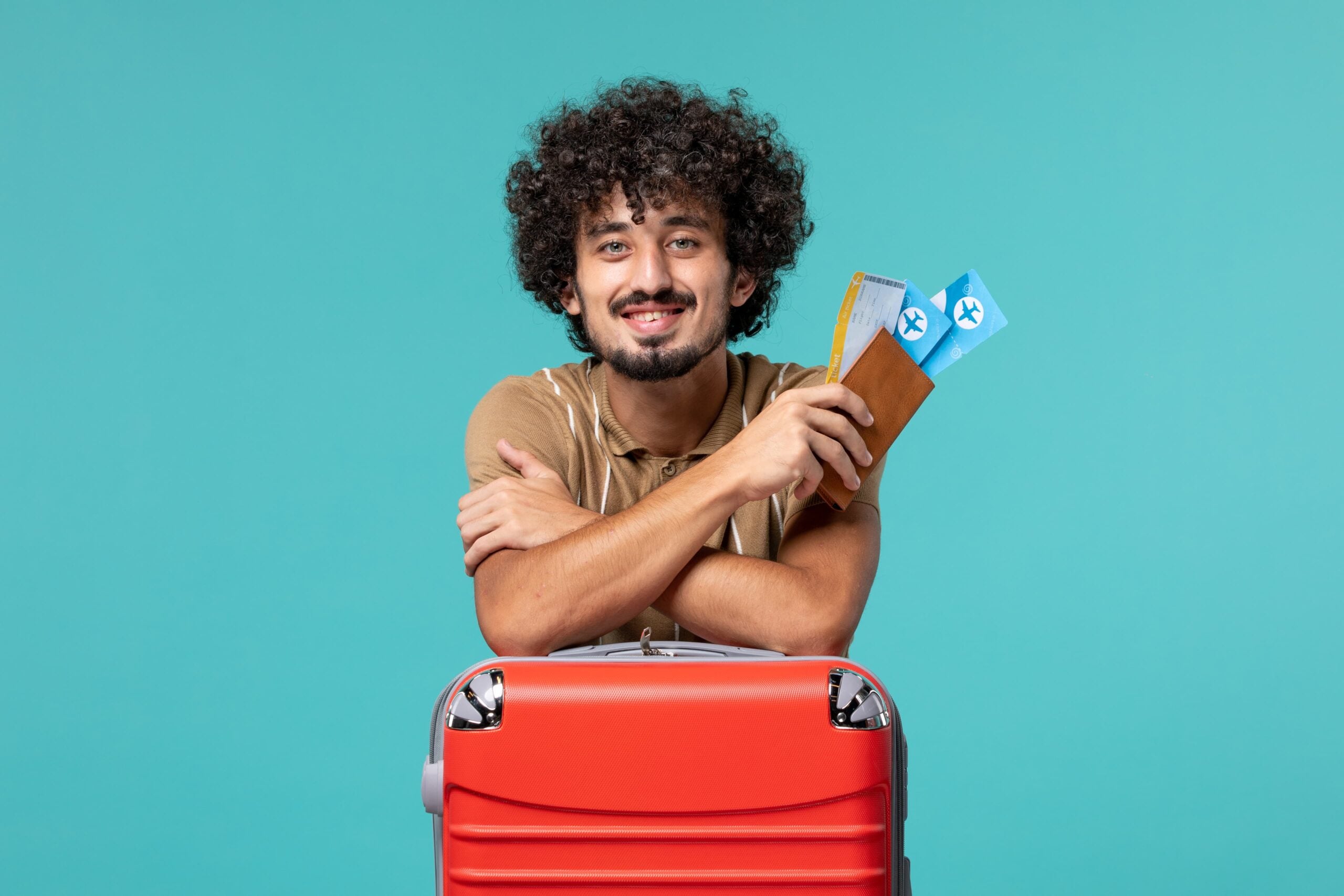 Homme valise billets
